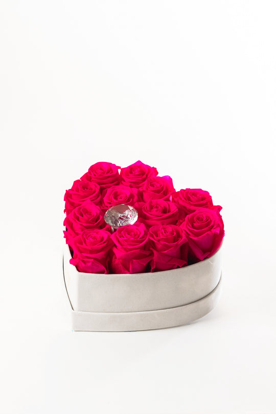 Hot pink preserved roses in a grey suede heart box with a crystal center, Rose Gold Victory