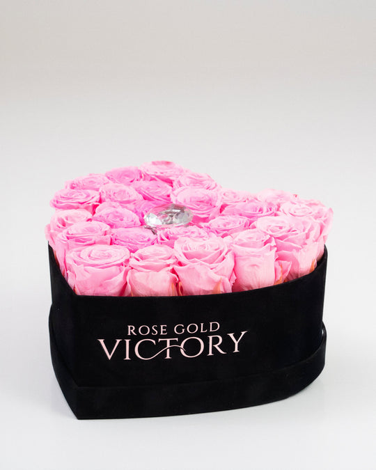 Pink preserved roses in a large black heart box with crystal accent — Rose Gold Victory