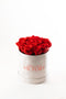Rosas rojas en caja redonda blanca (grande)