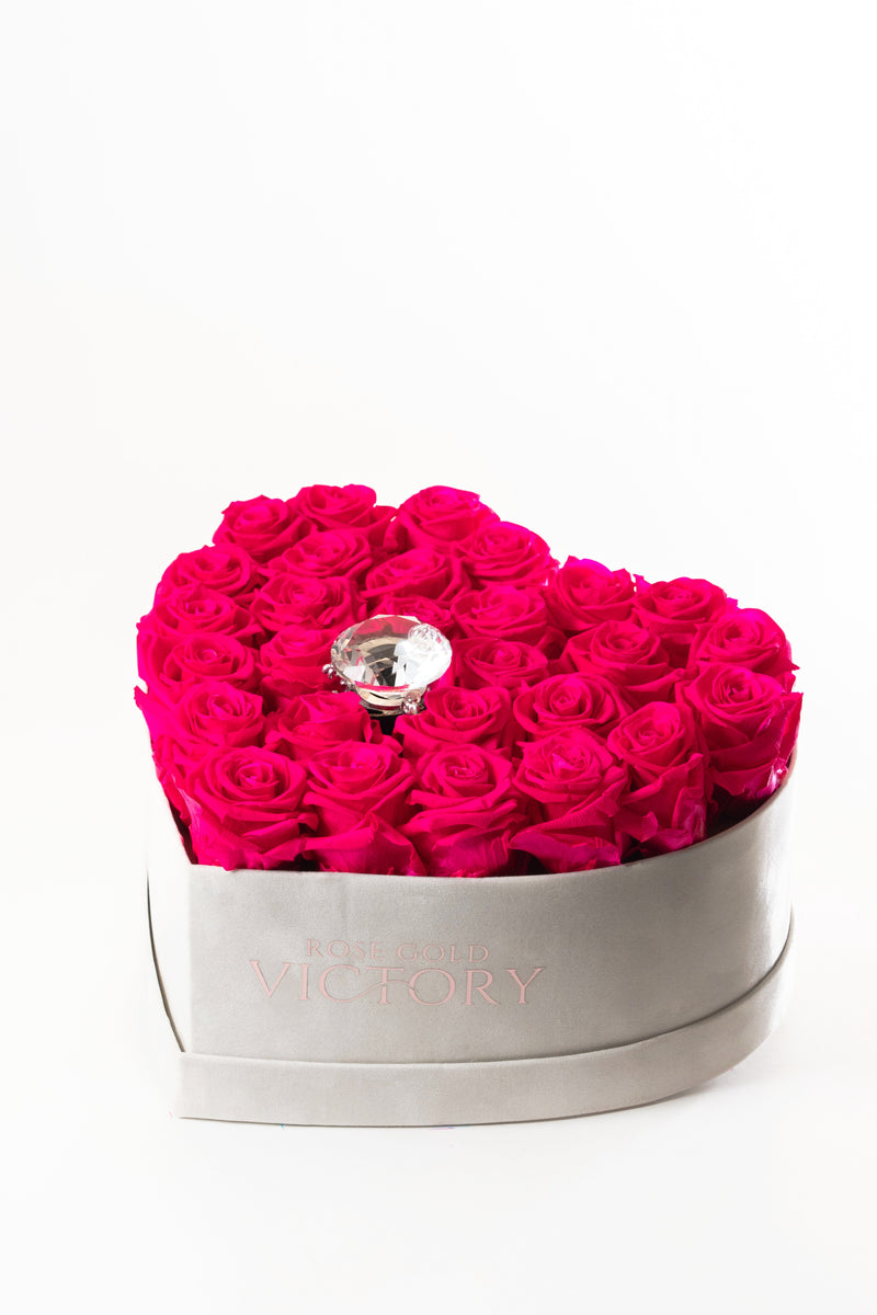 Hot pink preserved roses in a grey suede heart box with a crystal center, Rose Gold Victory