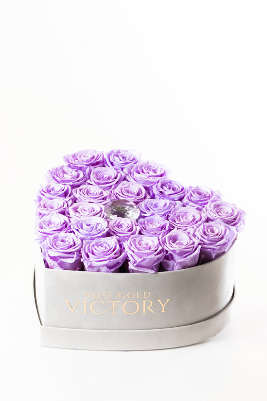 Lilac preserved roses in a grey suede heart box with a crystal center, Rose Gold Victory