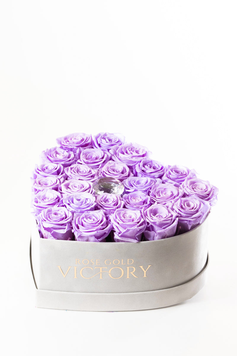 Lilac preserved roses in a grey suede heart box with a crystal center, Rose Gold Victory
