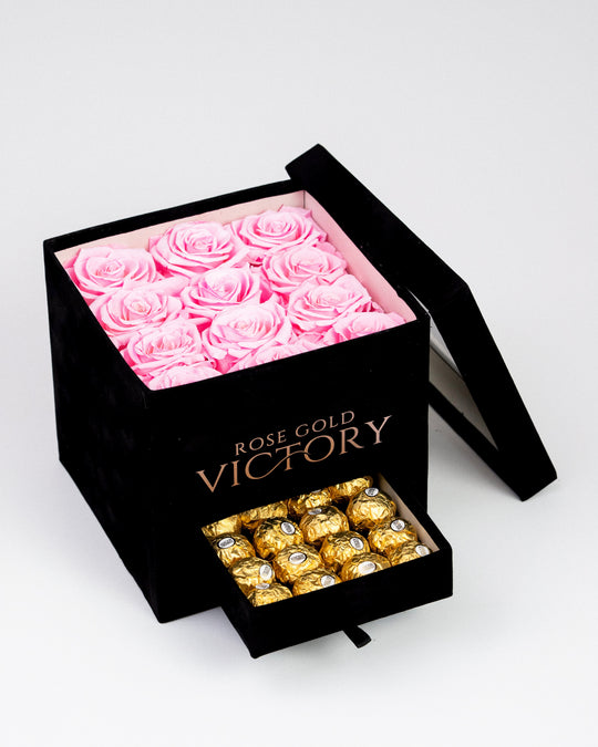 Pink preserved roses in a black square box with Ferrero Rocher chocolates — Rose Gold Victory