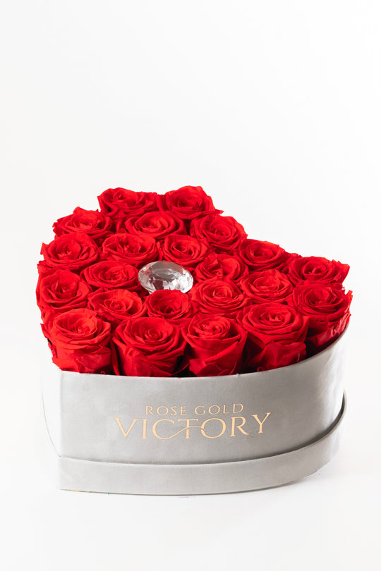 Red preserved roses in a grey suede heart box with a crystal center, Rose Gold Victory