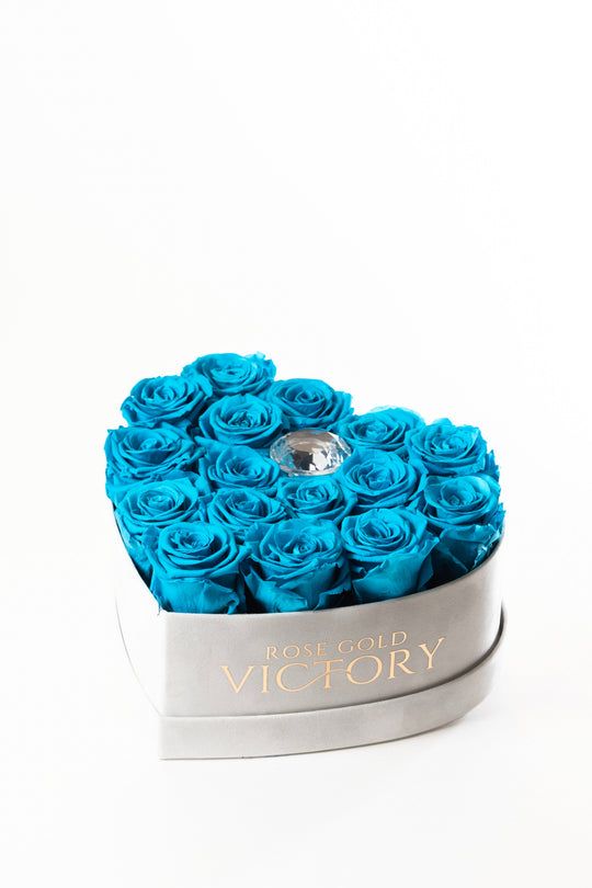 Tiffany blue preserved roses in a grey suede heart box with a crystal center, Rose Gold Victory