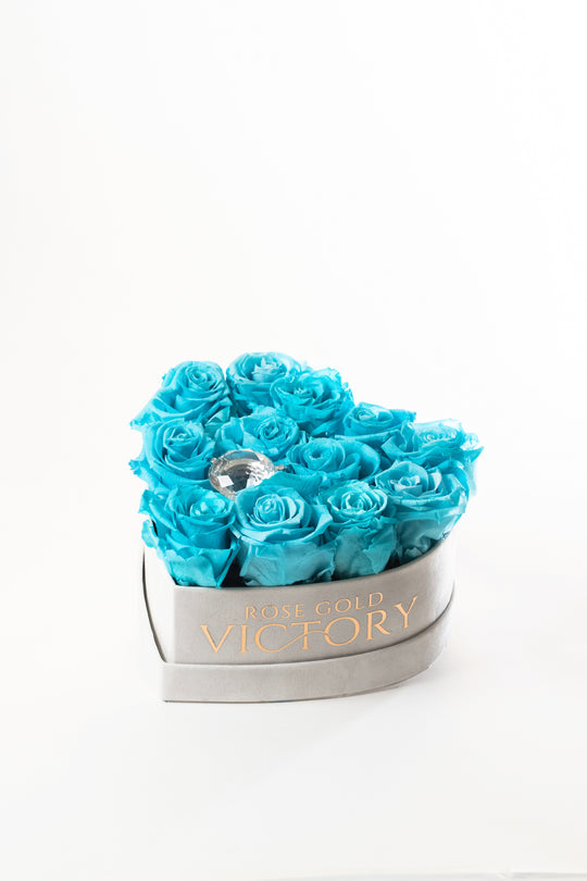 Tiffany blue preserved roses in a grey suede heart box with a crystal center, Rose Gold Victory